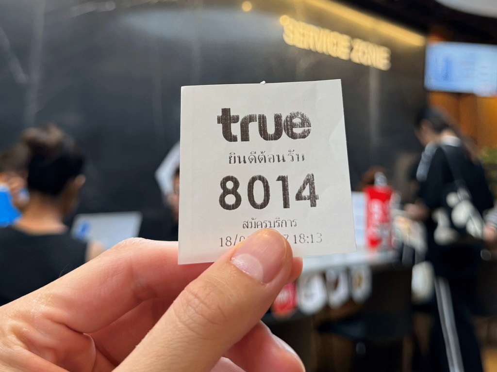 Trying to buy esim bangkok — a queue paper at True Service